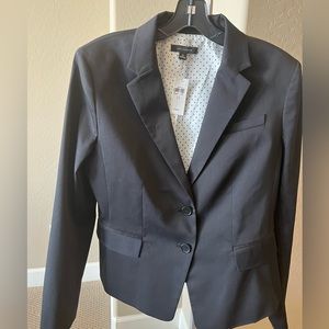 Ann Taylor Suit black includes jacket, pants and skirt.  Size 12.